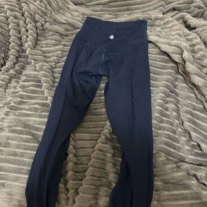 Lululemon leggings in the color navy and in a size 2-4
